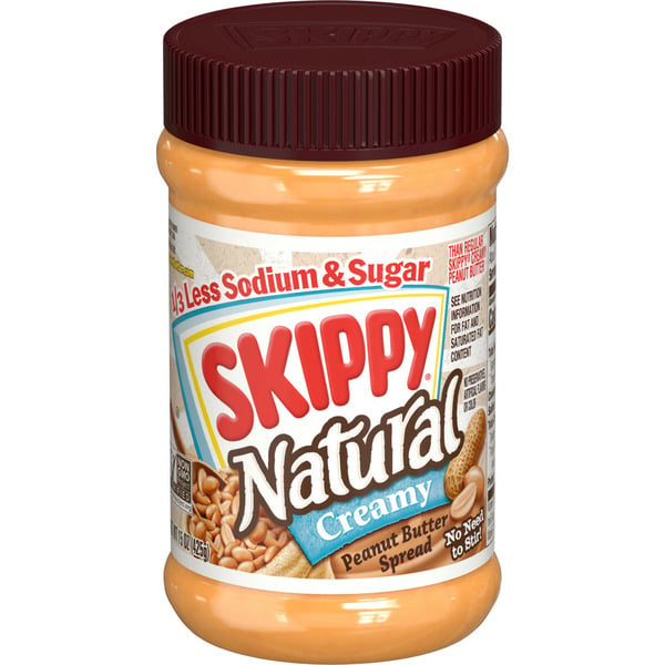 Spreads SKIPPY Creamy Natural 1/3Rd Less Sodium And Sugar Peanut Butter Spread hero