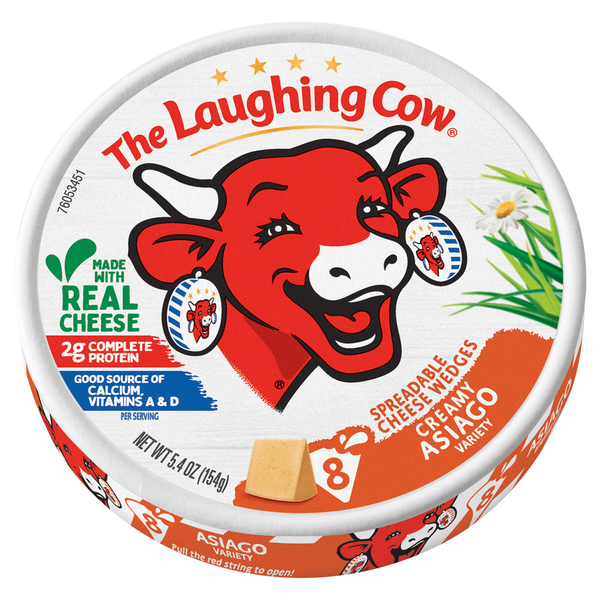 Specialty Cheeses The Laughing Cow Spreadable Cheese Wedges, Creamy Asiago Variety hero