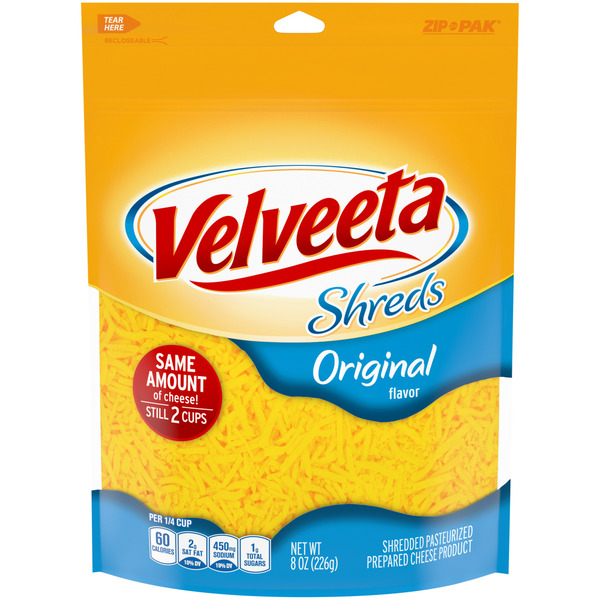 Packaged Cheese VELVEETA Shreds Original Flavored Shredded Cheese hero