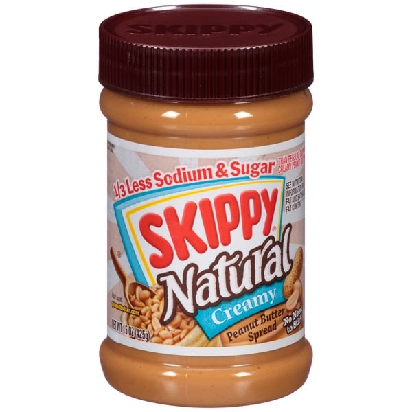 Spreads SKIPPY Creamy Natural 1/3Rd Less Sodium And Sugar Peanut Butter Spread hero