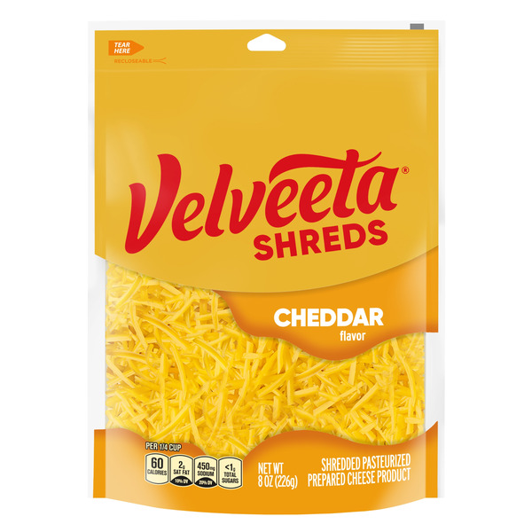 Packaged Cheese VELVEETA Shreds Cheddar Shredded Processed Cheese Product oz Bag hero