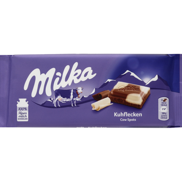 Candy & Chocolate Milka Milk and White Chocolate Confection, Cow Spots hero