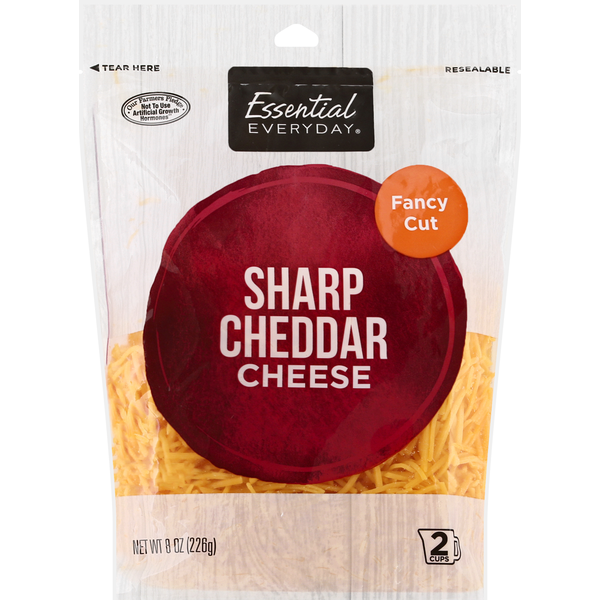 Packaged Cheese Essential Everyday Cheese, Sharp Cheddar, Fancy Cut hero