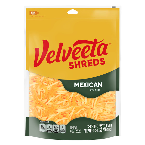 Packaged Cheese VELVEETA Shreds Mexican Style Cheddar Blend Shredded Processed Cheese Product oz Bag hero