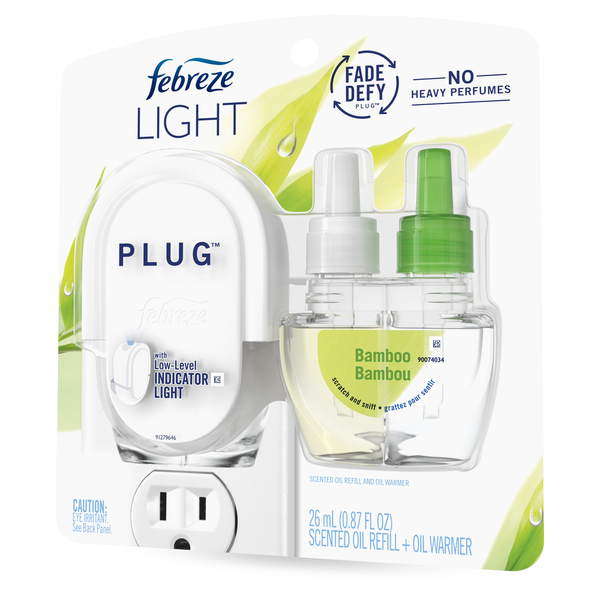 Air Fresheners & Candles Febreze LIGHT PLUG Air Freshener, Bamboo, Starter Kit &  Oil Refill hero