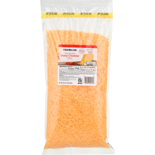 Packaged Cheese Food Lion Natural Fancy Shredded Sharp Cheddar Cheese hero