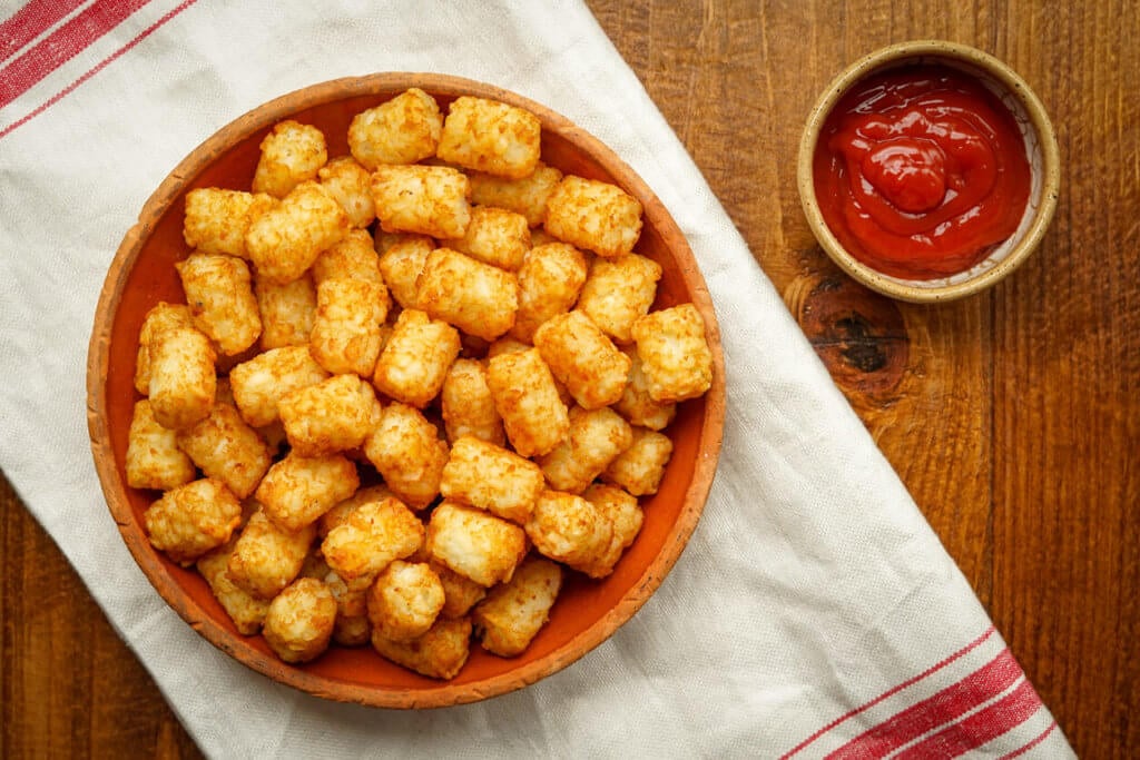 Tater tots with ketchup on the side