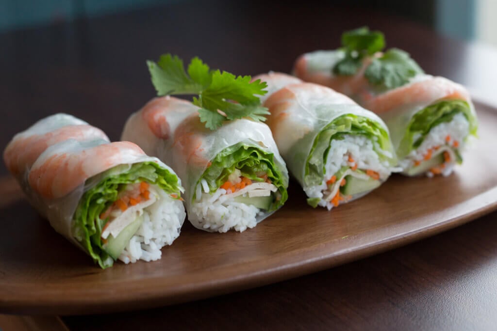 A healthy summer roll filled with healthy veggies and shrimp.