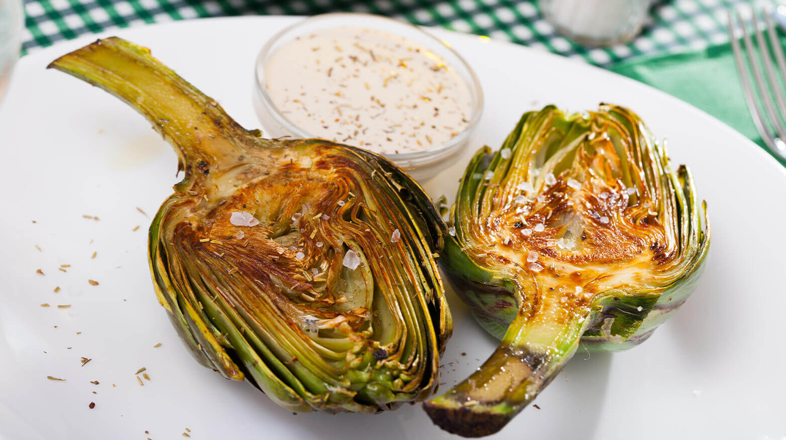 Grilled artichokes with garlic dip