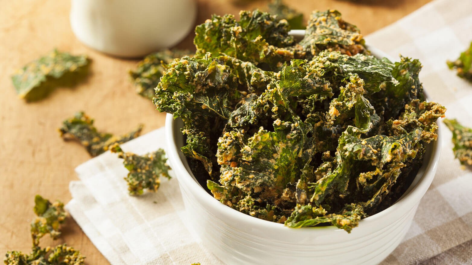 Crispy kale chips in bowl