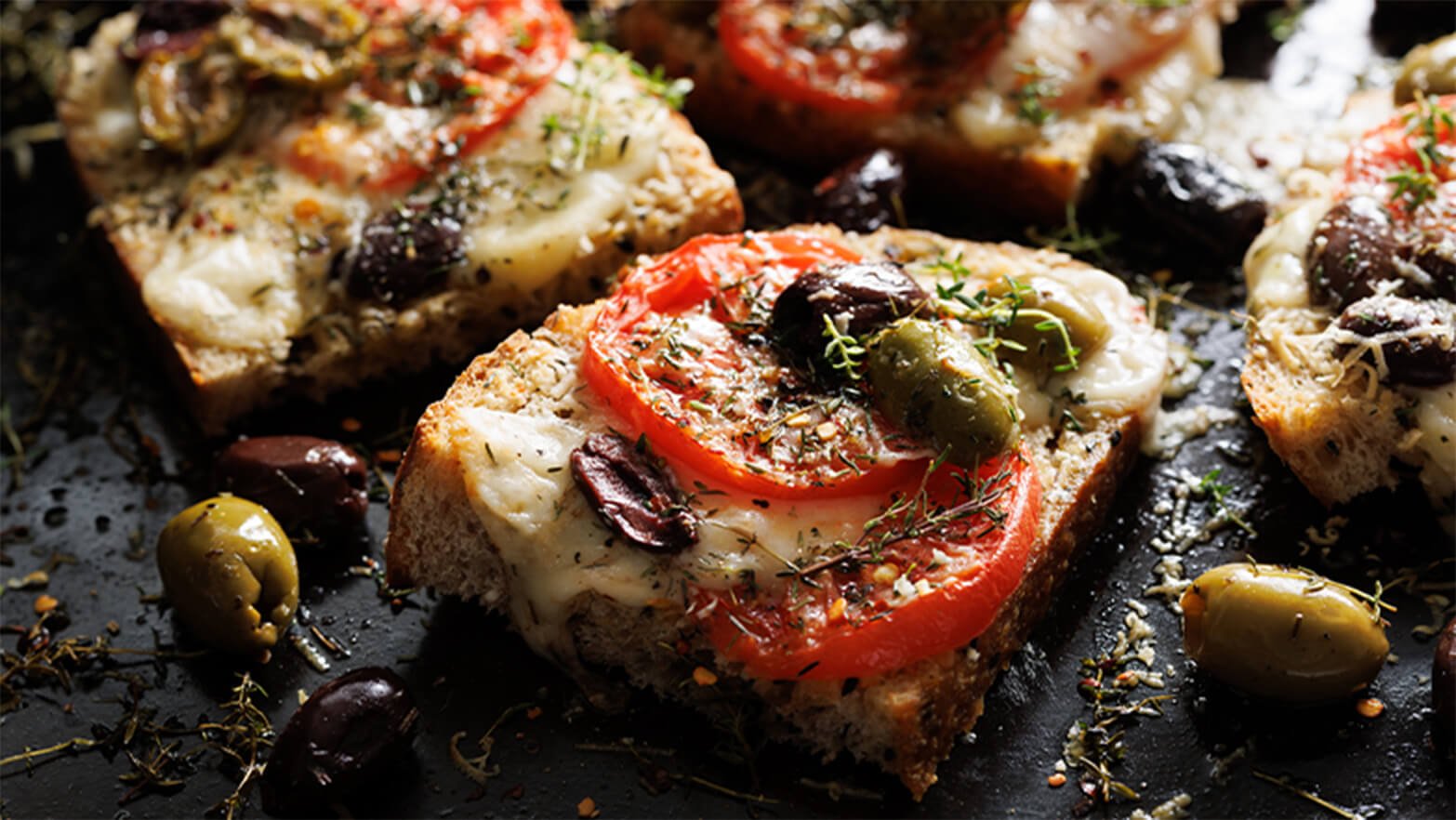 Olive and tomato crostinis