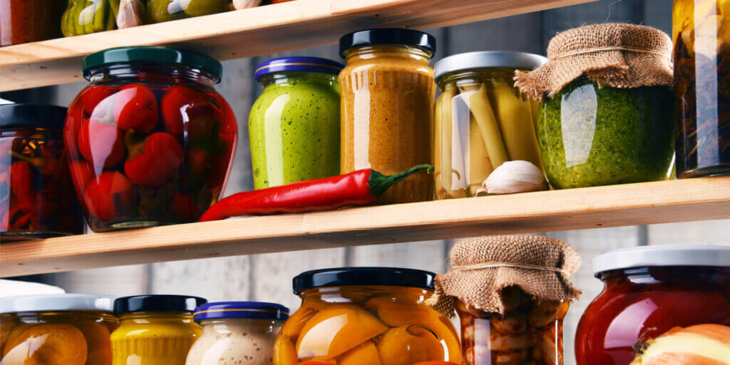 Stored vegetables on a shelf.