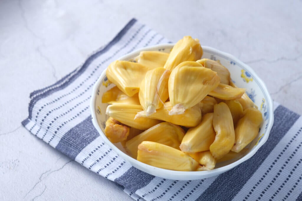 top view of slice of jackfruits in a bowl on table