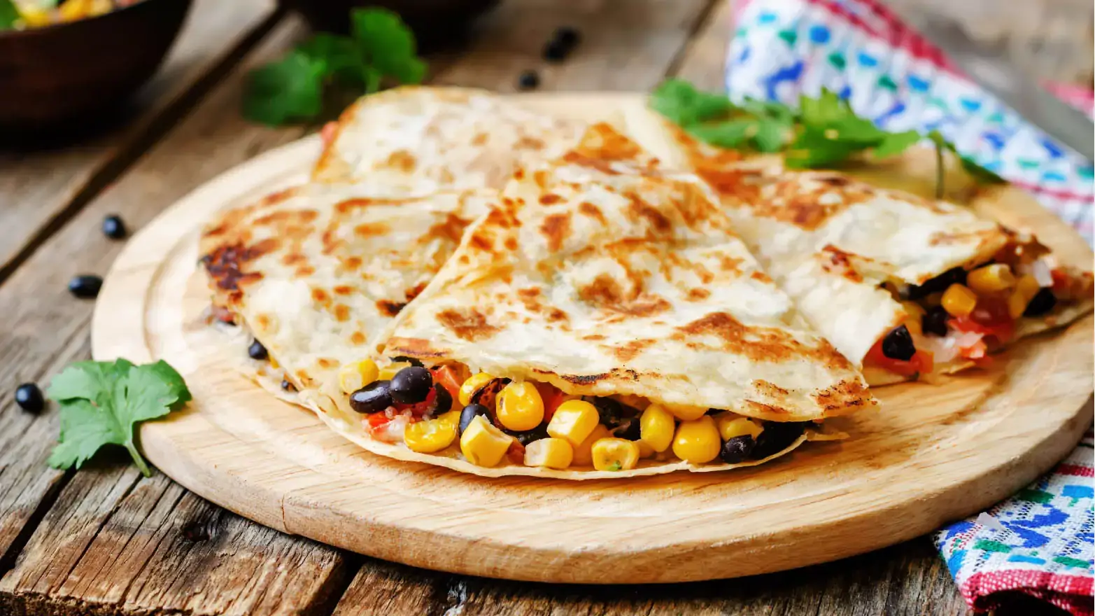 Simple cheese quesadilla with corn and black beans