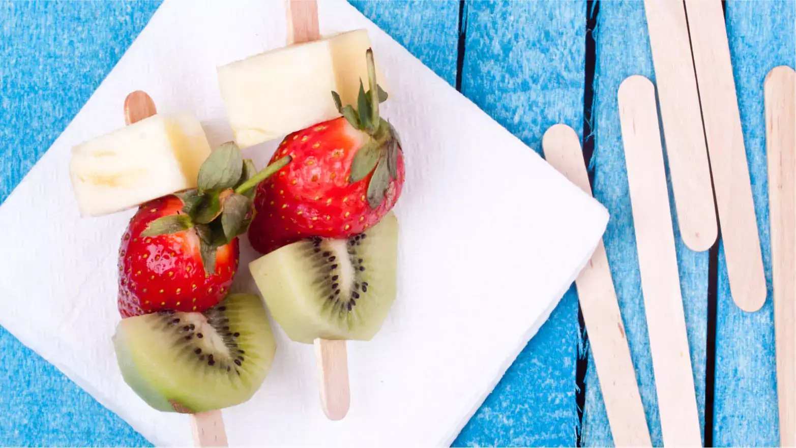 Kid-friendly fruit kebabs with pineapple, strawberry and kiwi