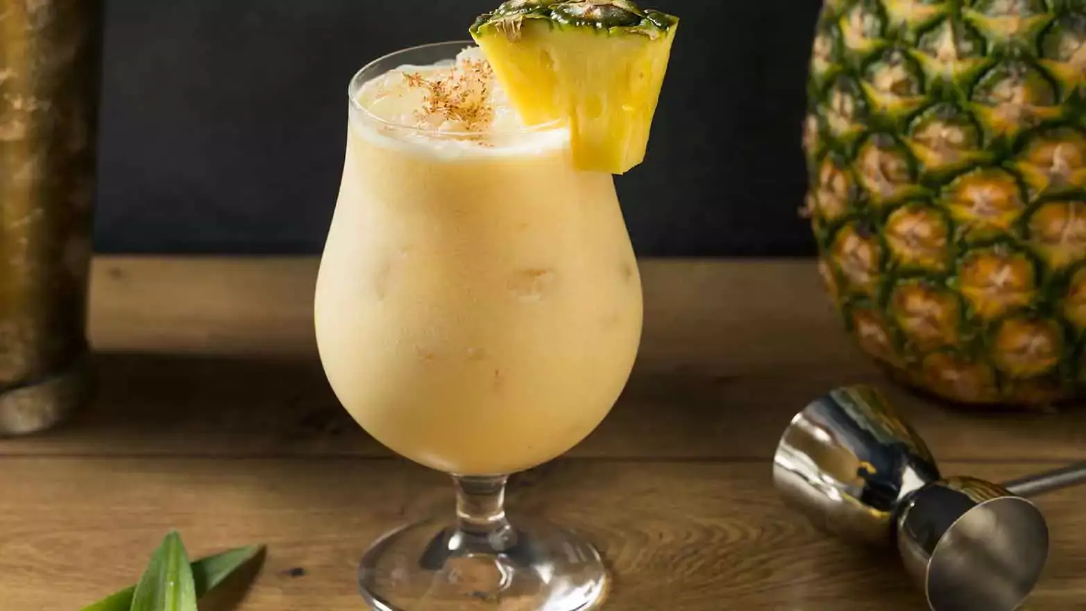 Painkiller cocktail with slice of pineapple