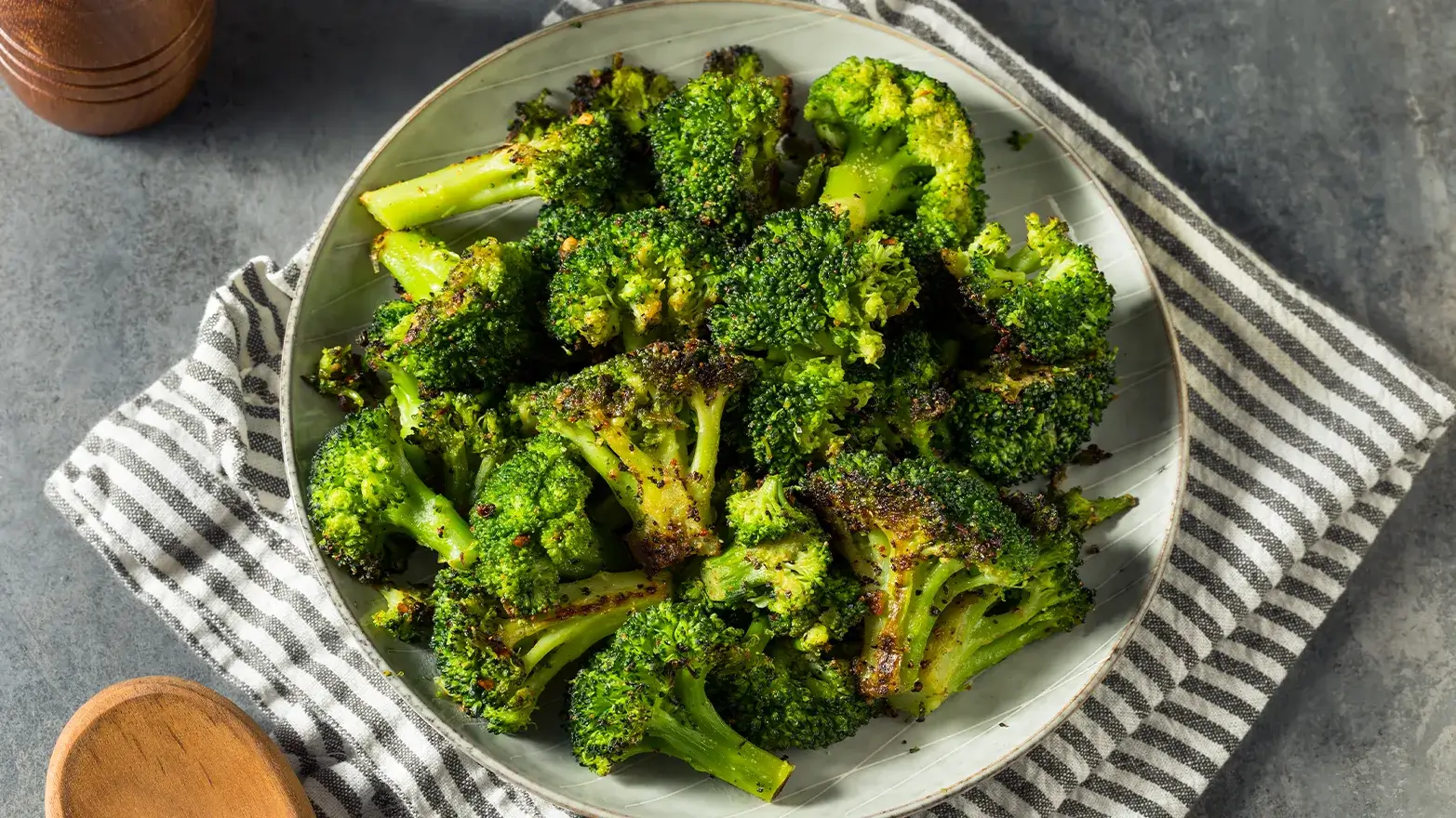 Charred broccoli on a dinner plate