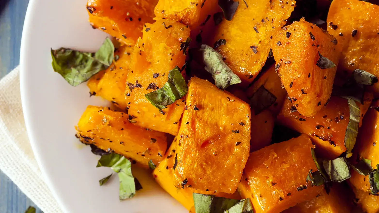 Baked butternut squash with basil.