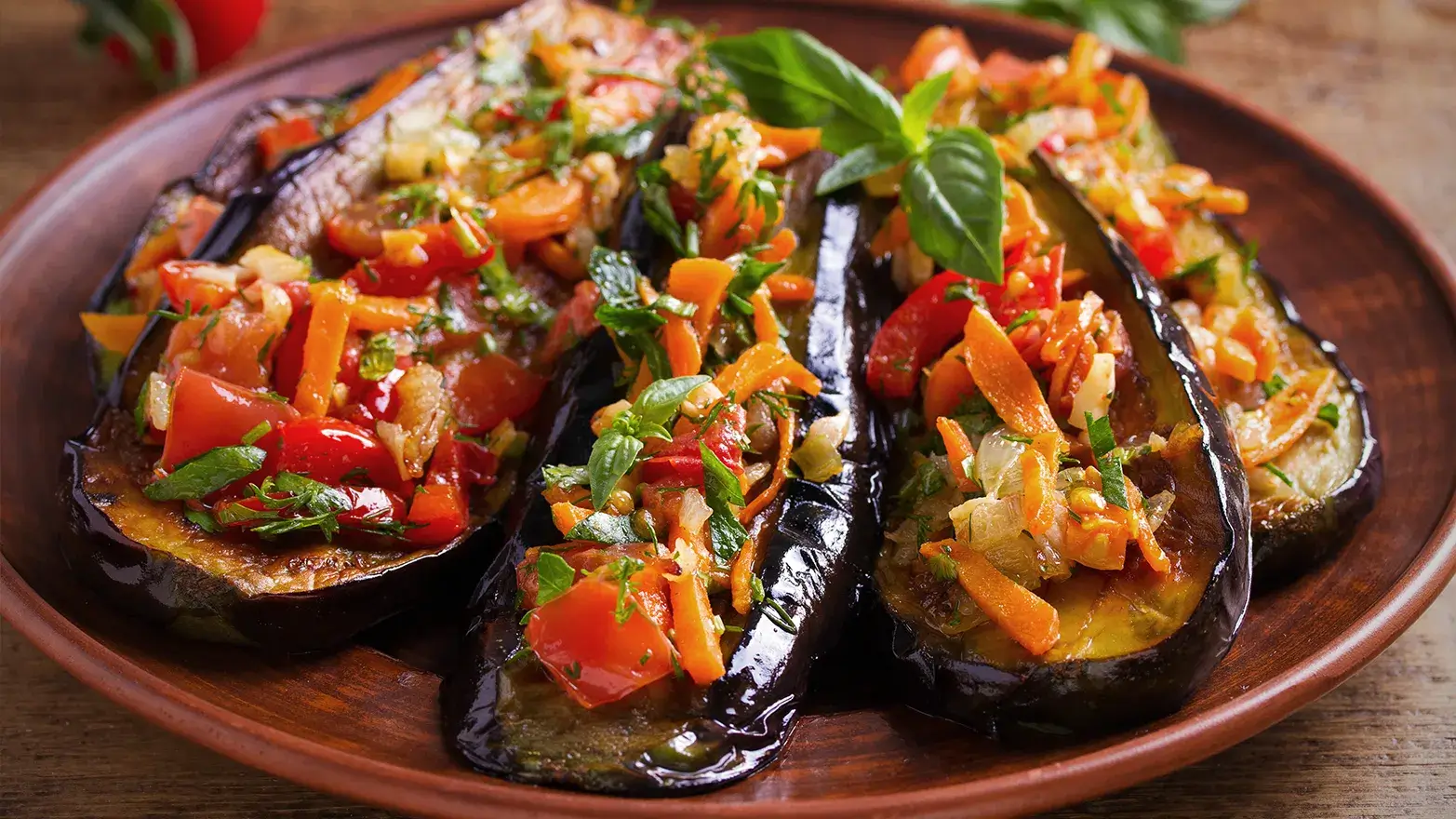 Roasted eggplant with tomatoes, carrots, and onion.