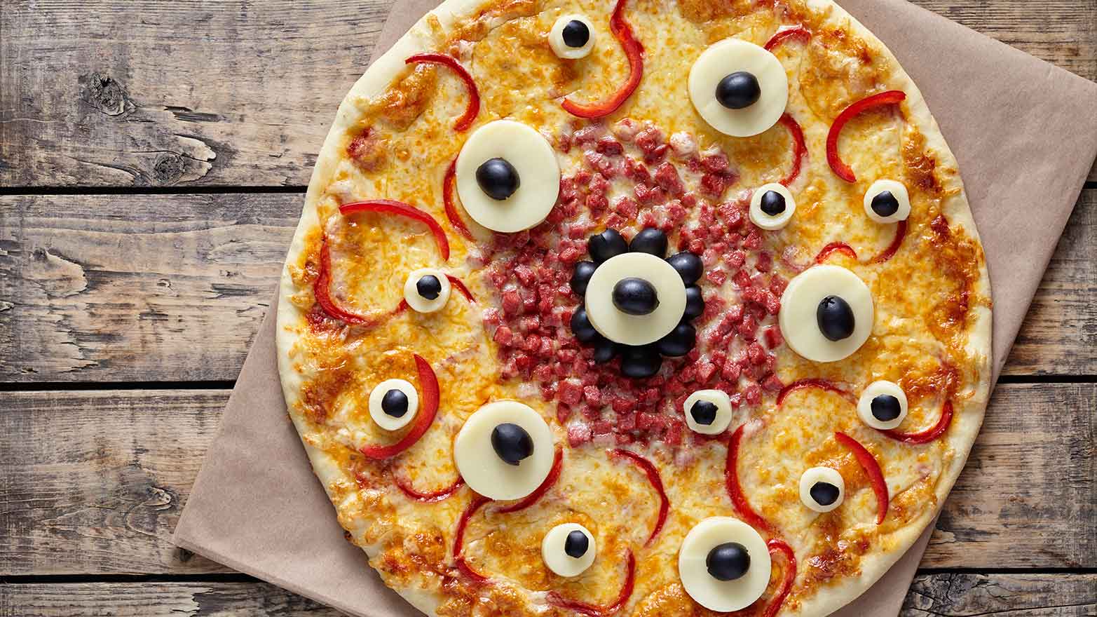 Halloween pizza with spooky toppings