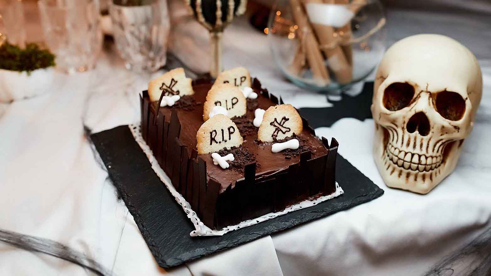 Brownies decorated with candy bone and cookie tombstones