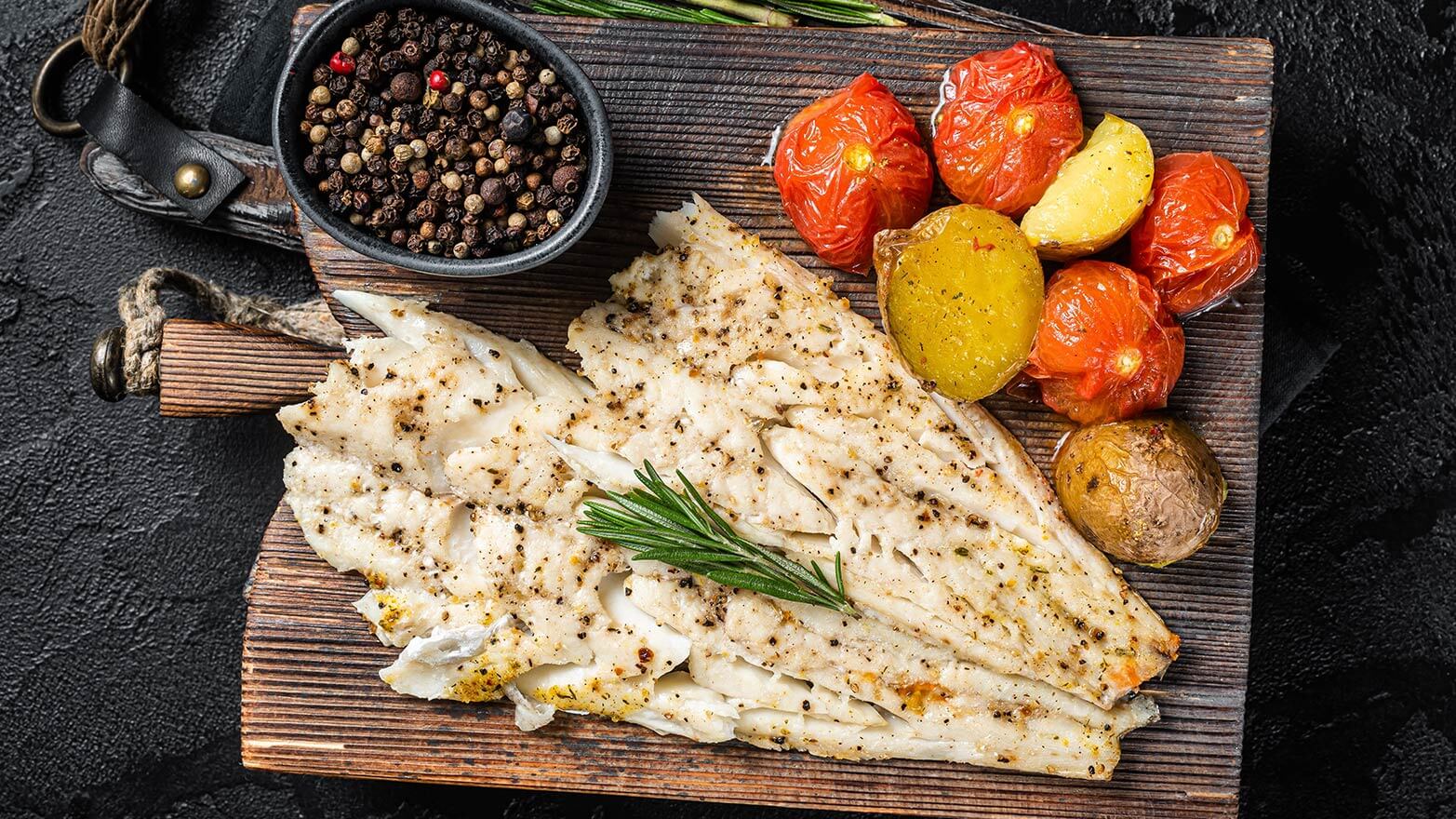 Baked haddock with seasoned veggies