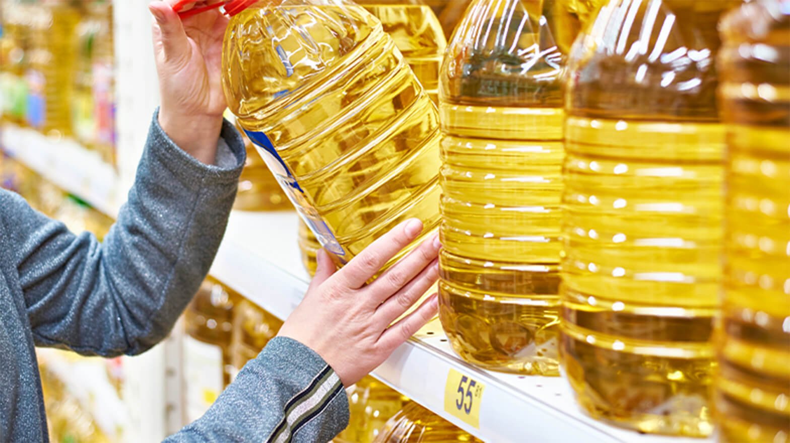 Person buying oil in bulk