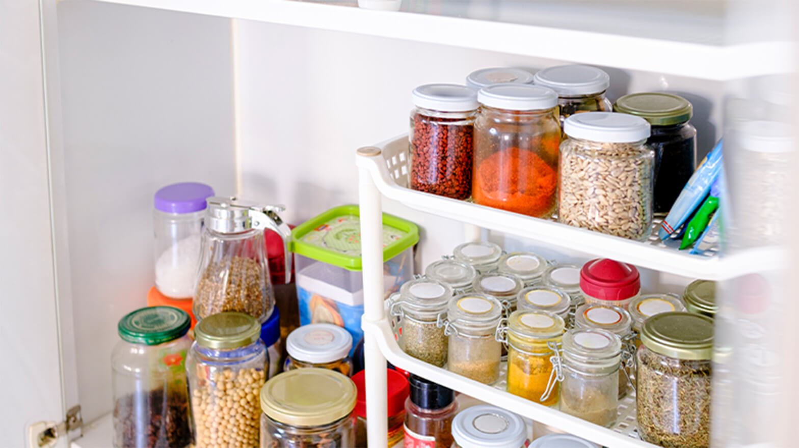 A pantry full of groceries after learning how to save money on them