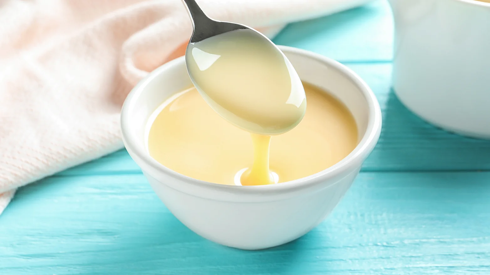 Stock image of condensed milk in a bowl