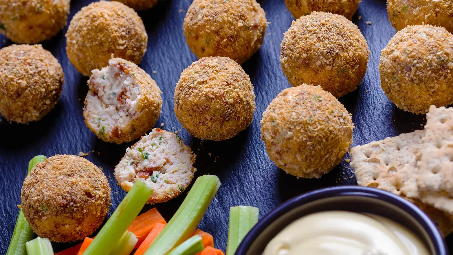 bacon cheddar cheese balls on a plate