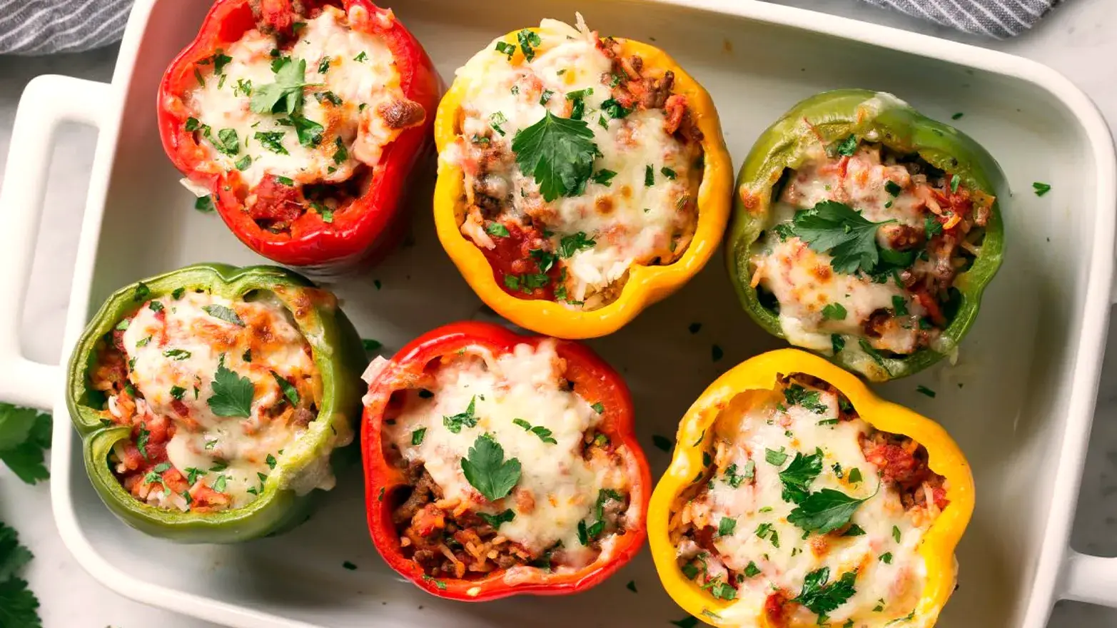 Baking sheet of stuffed peppers