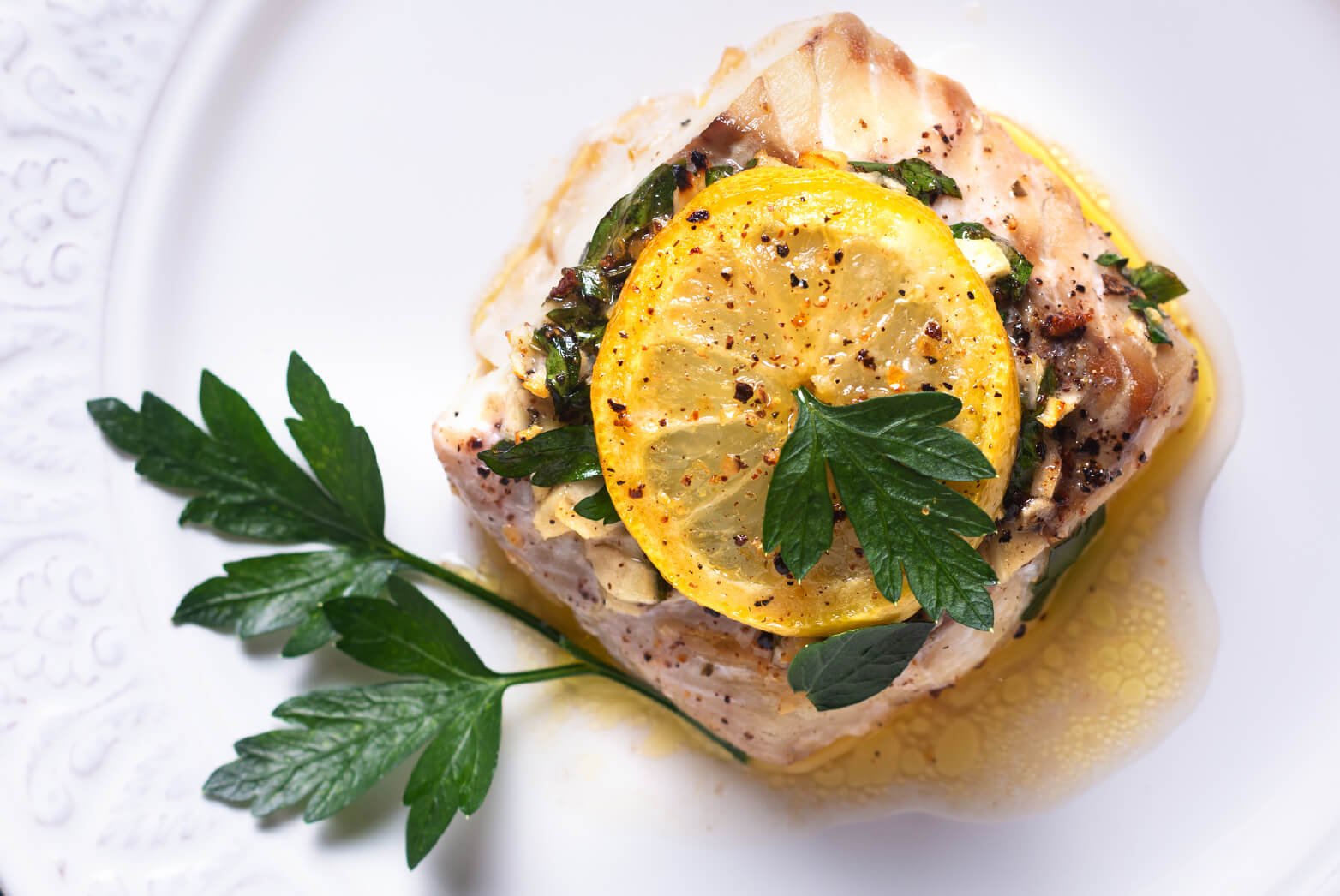 Lemon cod topped with fresh herbs