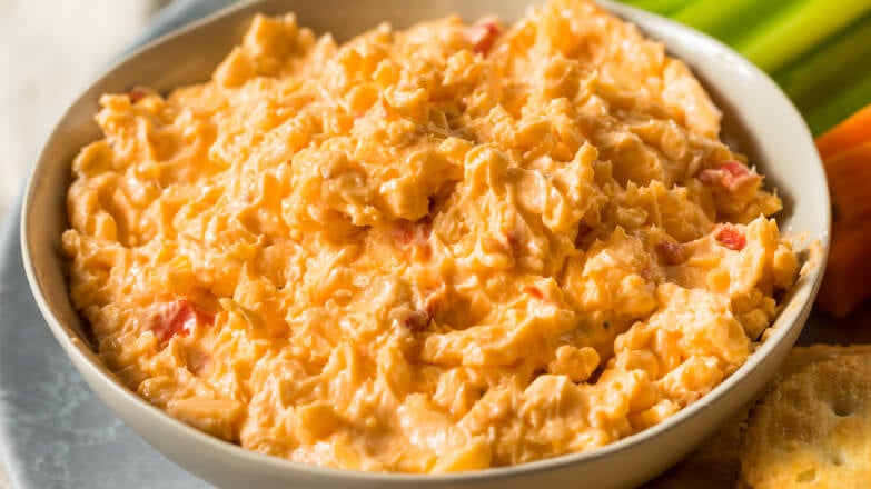 Large bowl of pimento cheese dip with crackers